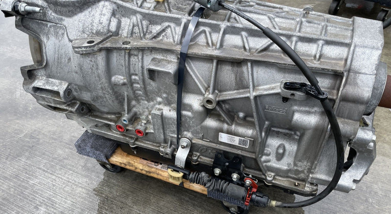 Load image into Gallery viewer, FORD MUSTANG ECOBOOST RWD AUTO TRANSMISSION ASSEMBLY 2.3L 92K MILES 18-23 112997