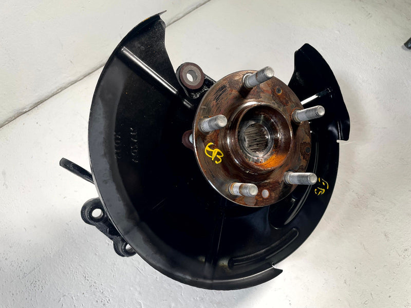 Load image into Gallery viewer, 2016-2025 MAZDA CX-5 AWD REAR LEFT SUSPENSION SPINDLE KNUCKLE W/ HUB # 113814