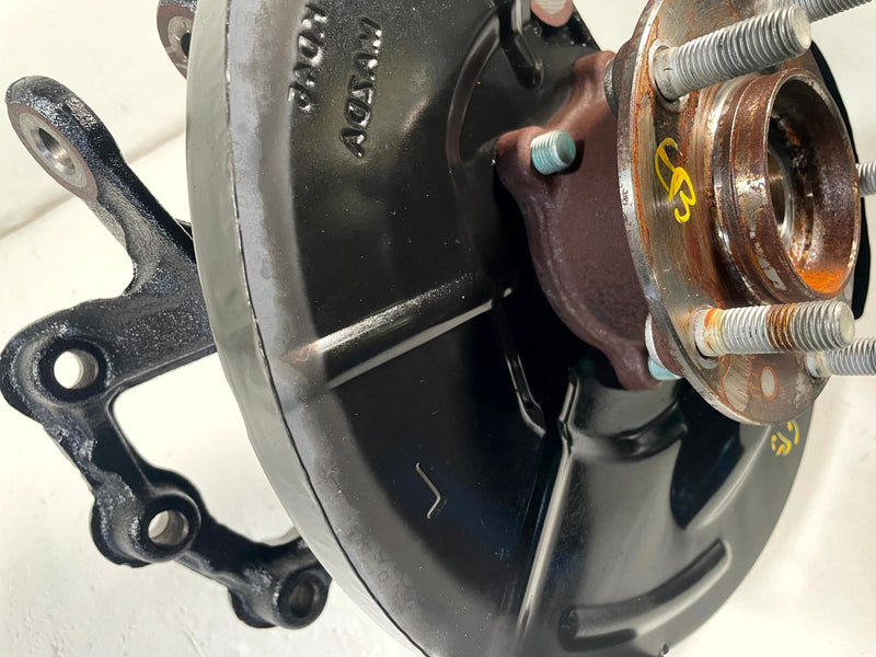 Load image into Gallery viewer, 2016-2025 MAZDA CX-5 AWD REAR LEFT SUSPENSION SPINDLE KNUCKLE W/ HUB # 113814