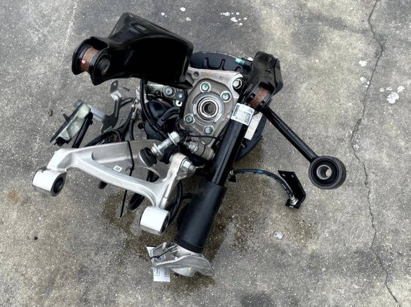 Load image into Gallery viewer, 2021-2025 NISSAN ROGUE AWD REAR RIGHT SIDE SUSPENSION KNEE ASSEMBLY # 106873