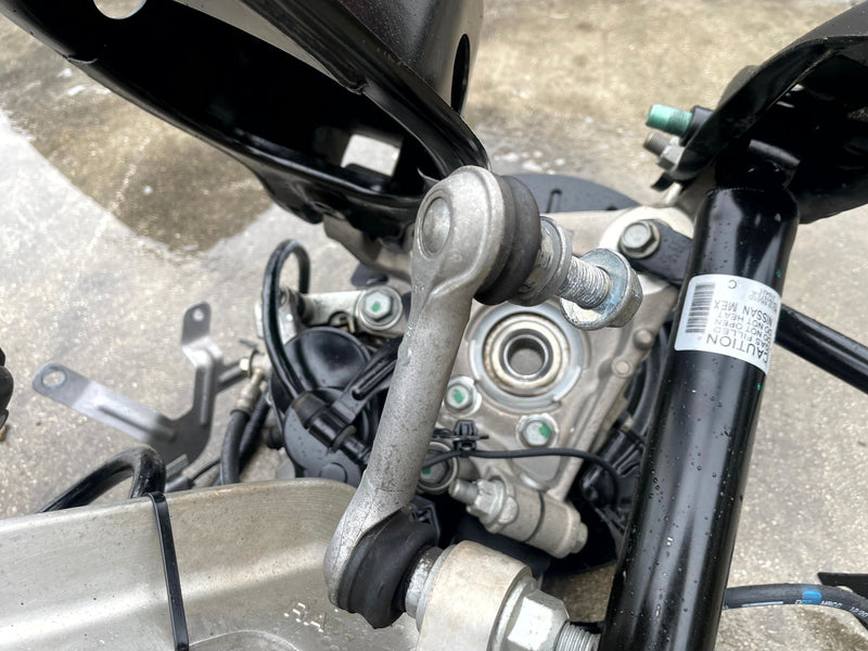 Load image into Gallery viewer, 2021-2025 NISSAN ROGUE AWD REAR RIGHT SIDE SUSPENSION KNEE ASSEMBLY # 106873