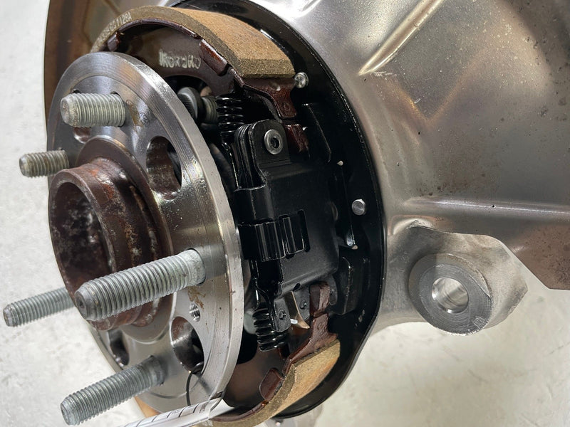 Load image into Gallery viewer, 2019 - 2026 GENESIS G70 REAR LEFT DRIVER SIDE SPINDLE KNUCKLE & HUB # 110038