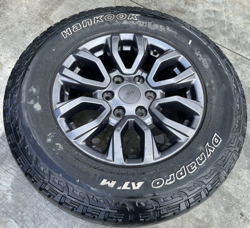 Load image into Gallery viewer, FORD RANGER 17x8 12 SPOKE GRAY ALLOY WHEEL RIM W/TIRE (ONLY#1) 2019-2023 #112228