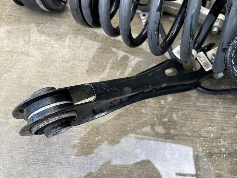Load image into Gallery viewer, 2023-2025 HYUNDAI IONIQ 6 RWD REAR LEFT SIDE SUSPENSION KNEE ASSEMBLY # 112322