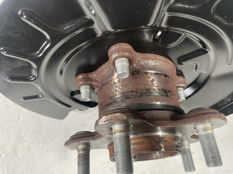 Load image into Gallery viewer, 2021 - 2025 NISSAN ROGUE REAR LEFT DRIVER SIDE SPINDLE KNUCKLE HUB # 111674