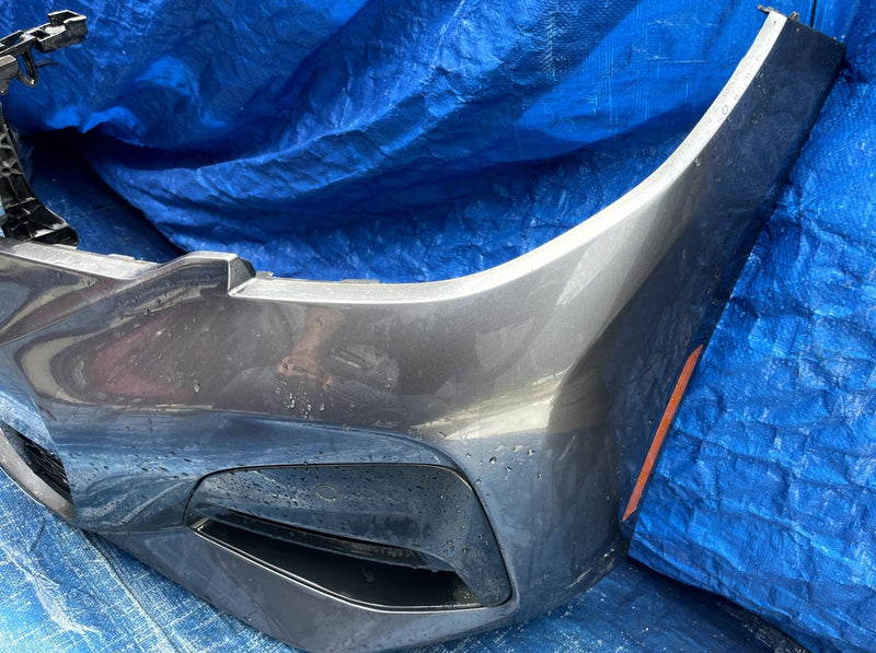 Load image into Gallery viewer, BMW G20 330i FRONT BUMPER COVER ASSEMBLY W/ PARK ASSIST GRAY (B39) 19-22 #110307