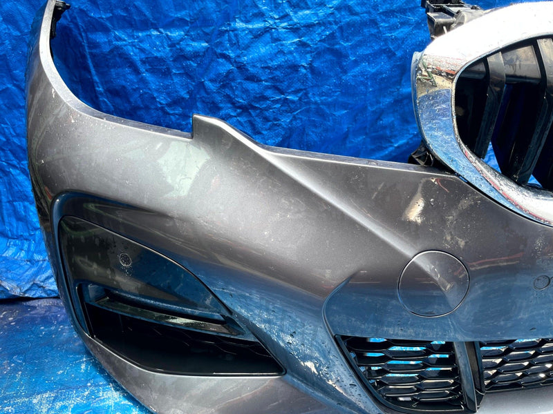 Load image into Gallery viewer, BMW G20 330i FRONT BUMPER COVER ASSEMBLY W/ PARK ASSIST GRAY (B39) 19-22 #110307