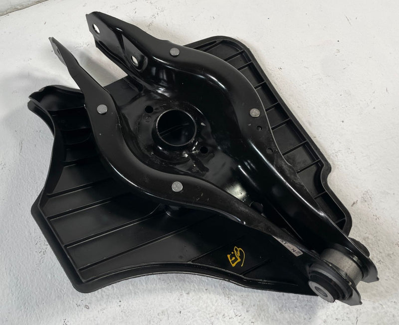 Load image into Gallery viewer, BMW 330i 330e REAR RIGHT PASSENGER SIDE LOWER CONTROL ARM SPRING PERCH # 106376