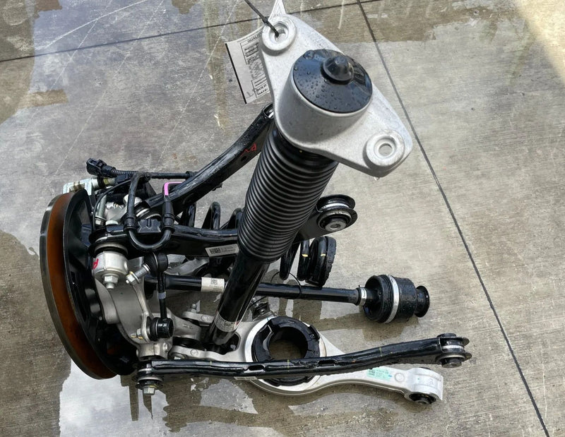 Load image into Gallery viewer, 2023-2025 HYUNDAI IONIQ 6 RWD REAR LEFT SIDE SUSPENSION KNEE ASSEMBLY # 112322