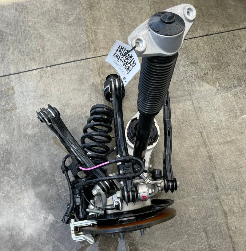Load image into Gallery viewer, 2023-2025 HYUNDAI IONIQ 6 RWD REAR LEFT SIDE SUSPENSION KNEE ASSEMBLY # 112322