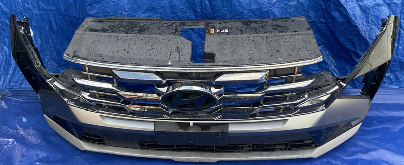 Load image into Gallery viewer, 2025 HYUNDAI TUCSON LIMITED FRONT BUMPER ASSY W/ PARK SENSOR BLACK (S3B) #105996
