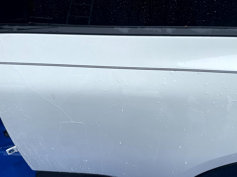 Load image into Gallery viewer, NISSAN ROGUE REAR LEFT DRIVER SIDE DOOR ASSEMBLY WHITE (QAK) 2021-2025 # 106874
