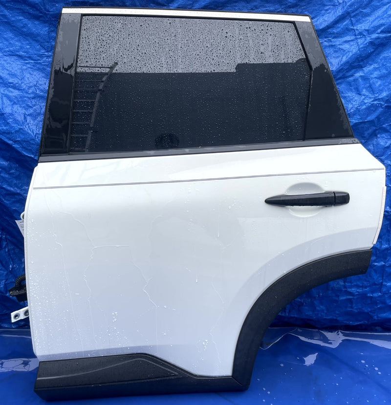 Load image into Gallery viewer, NISSAN ROGUE REAR LEFT DRIVER SIDE DOOR ASSEMBLY WHITE (QAK) 2021-2025 # 106874
