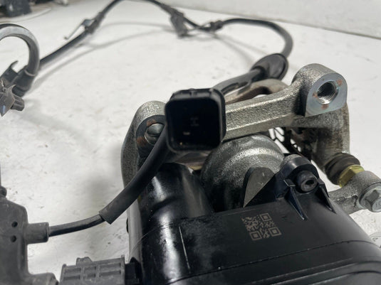 2023 - 2026 KIA SPORTAGE REAR LEFT DRIVER SIDE BRAKE CALIPER ASSEMBLY