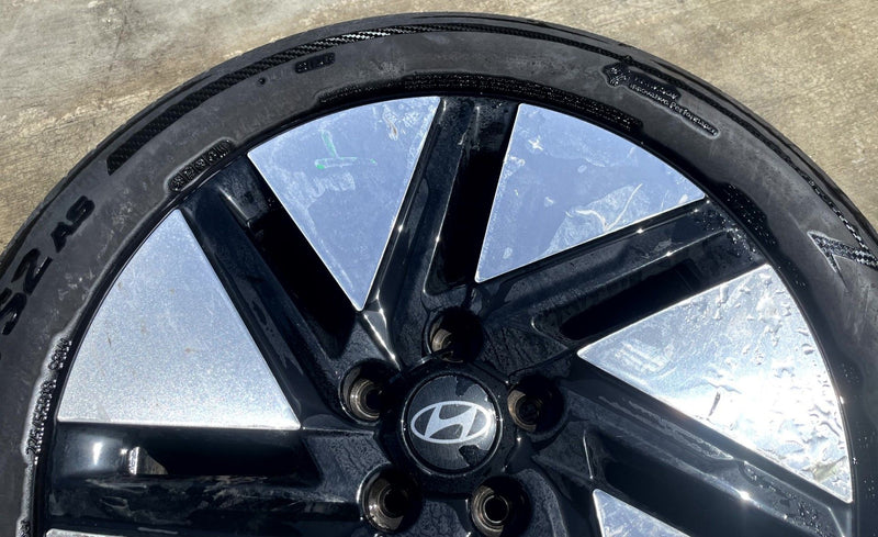 Load image into Gallery viewer, HYUNDAI IONIQ 6 18x7.5 BLACK 7-SLOT ALLOY WHEEL RIM W/TIRE (ONLY#1) 23-25 110917
