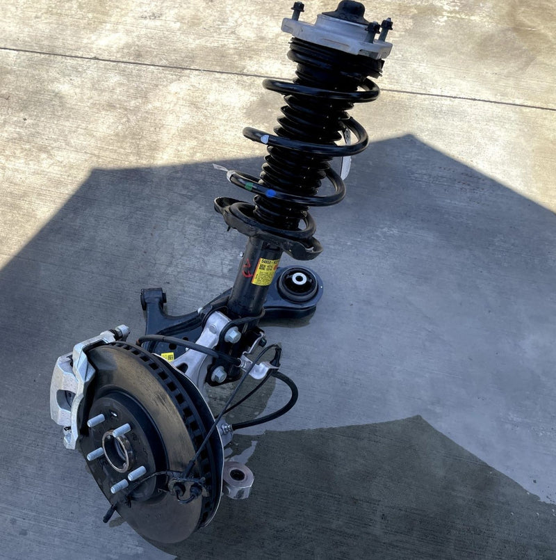 Load image into Gallery viewer, 2023-2025 HYUNDAI IONIQ 6 RWD FRONT LEFT SIDE SUSPENSION KNEE ASSEMBLY # 110911
