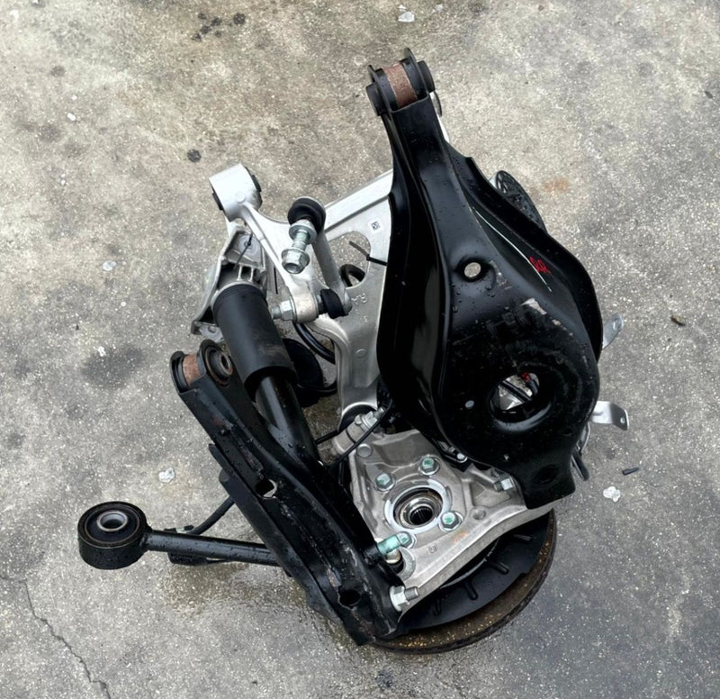 Load image into Gallery viewer, 2021-2025 NISSAN ROGUE AWD REAR RIGHT SIDE SUSPENSION KNEE ASSEMBLY # 106873

