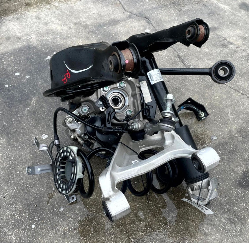 Load image into Gallery viewer, 2021-2025 NISSAN ROGUE AWD REAR RIGHT SIDE SUSPENSION KNEE ASSEMBLY # 106873
