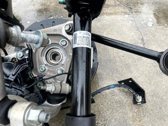 2021-2025 NISSAN ROGUE AWD REAR RIGHT SIDE SUSPENSION KNEE ASSEMBLY