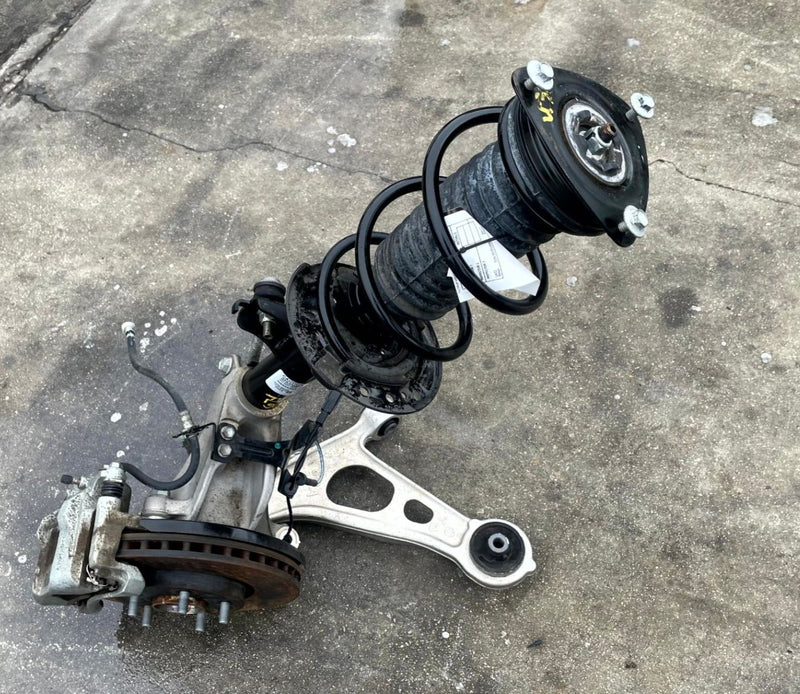 Load image into Gallery viewer, 2021 - 2023 NISSAN ROGUE AWD FRONT LEFT SIDE SUSPENSION KNEE ASSEMBLY # 106872
