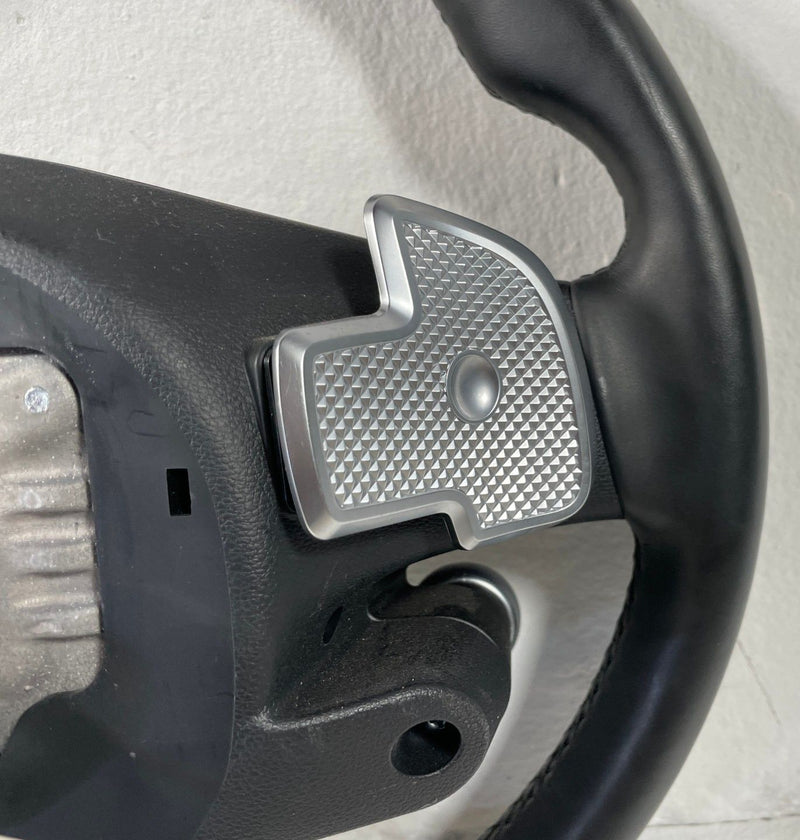 Load image into Gallery viewer, 2022-2024 HYUNDAI IONIQ 5 STEERING COLUMN WHEEL LEATHER W/ SWITCH BLACK # 108609
