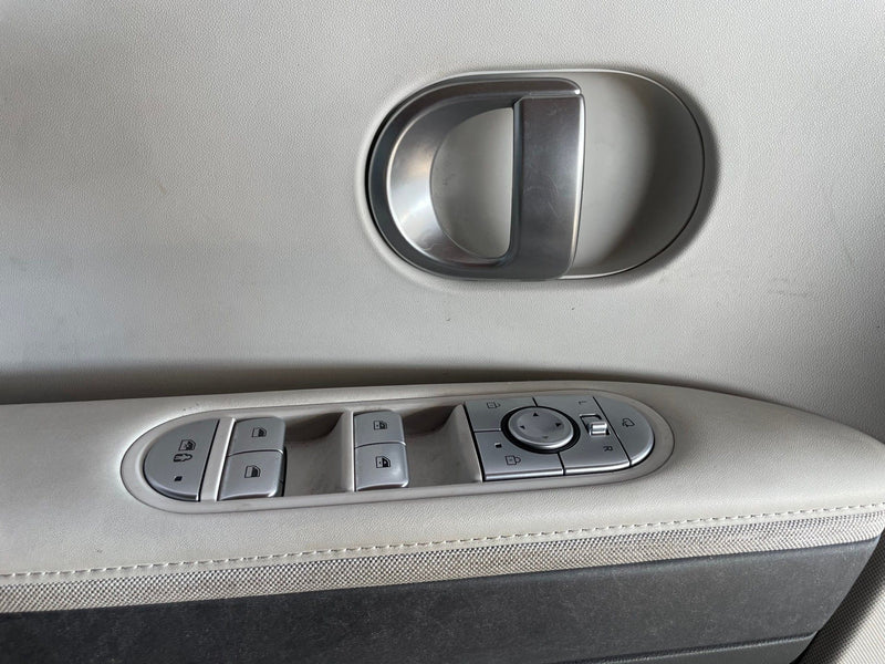 Load image into Gallery viewer, 2022-2024 HYUNDAI IONIQ 5 FRONT LEFT SIDE INTERIOR DOOR PANEL TRIM COVER #107298
