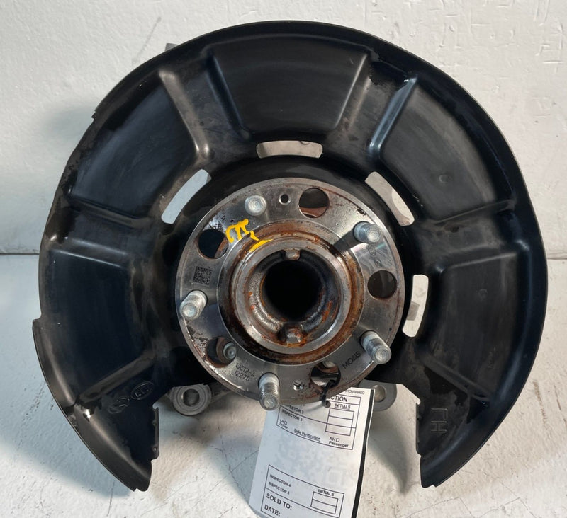 Load image into Gallery viewer, 2020-25 KIA TELLURIDE FWD REAR LEFT SIDE SPINDLE KNUCKLE W/ BEARING HUB # 107142
