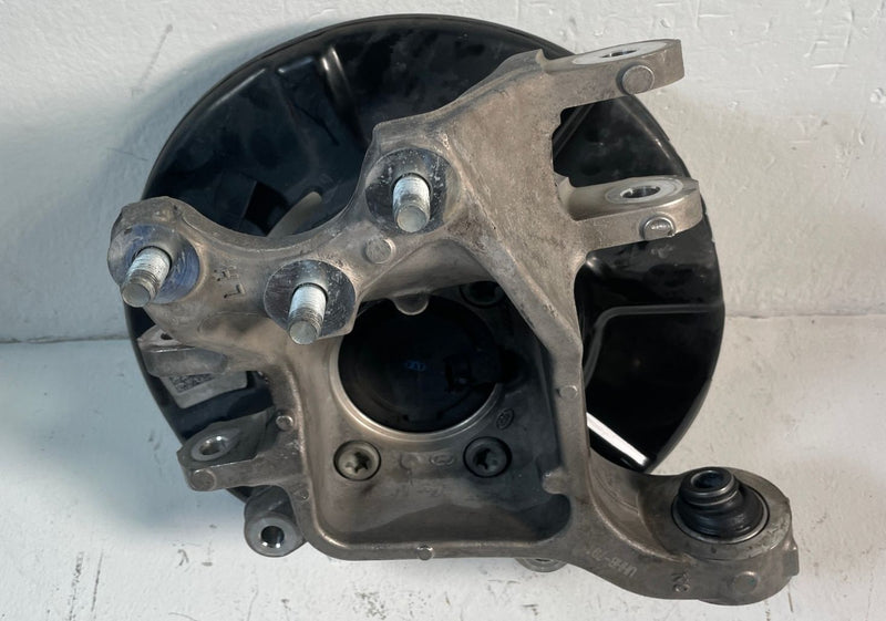 Load image into Gallery viewer, 2020-25 KIA TELLURIDE FWD REAR LEFT SIDE SPINDLE KNUCKLE W/ BEARING HUB # 107142
