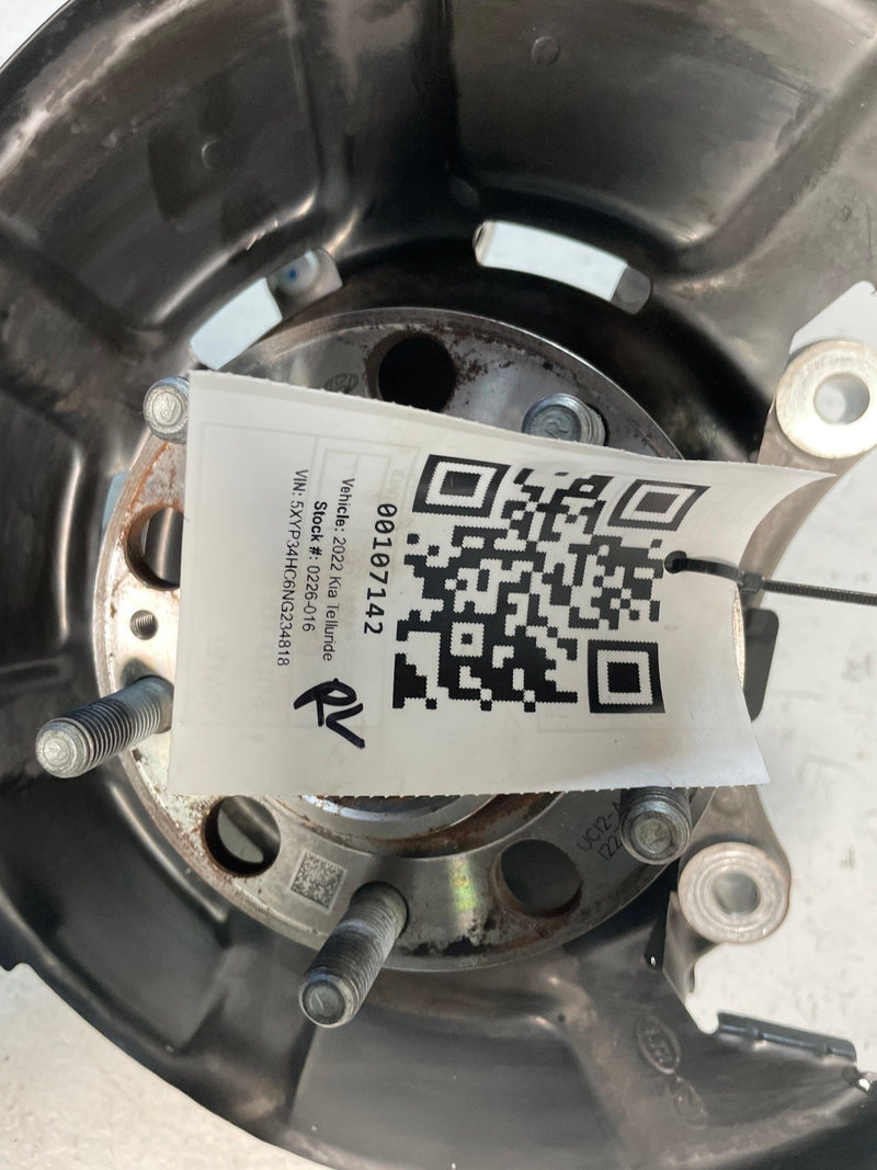 Load image into Gallery viewer, 2020-25 KIA TELLURIDE FWD REAR LEFT SIDE SPINDLE KNUCKLE W/ BEARING HUB # 107142
