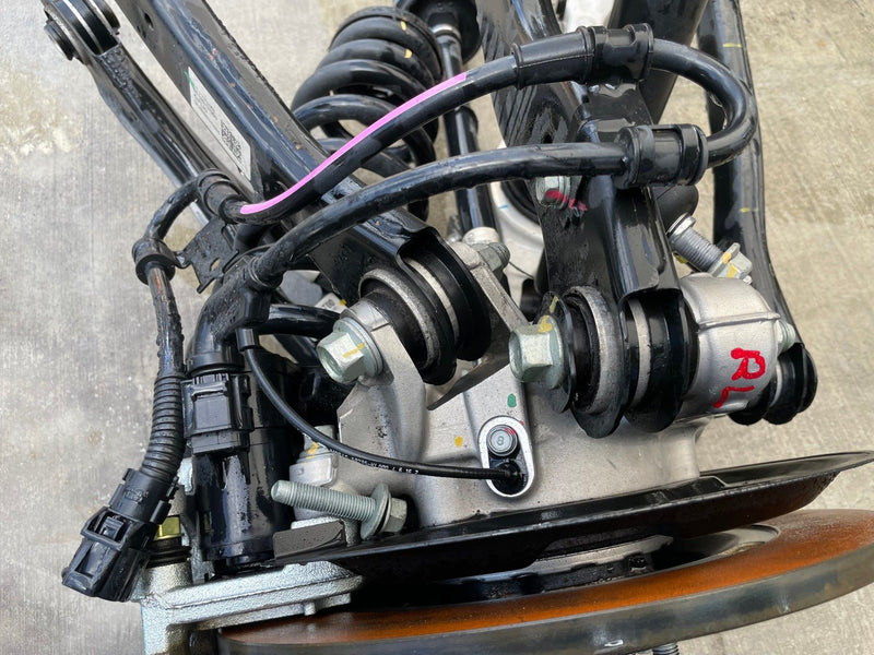 Load image into Gallery viewer, 2023-2025 HYUNDAI IONIQ 6 RWD REAR LEFT SIDE SUSPENSION KNEE ASSEMBLY # 112322

