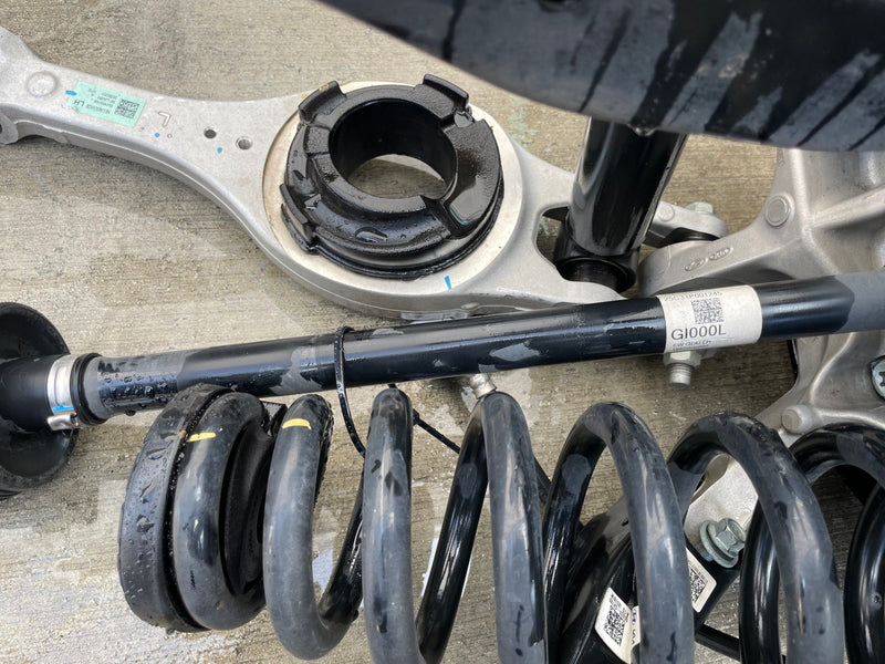 Load image into Gallery viewer, 2023-2025 HYUNDAI IONIQ 6 RWD REAR LEFT SIDE SUSPENSION KNEE ASSEMBLY # 112322

