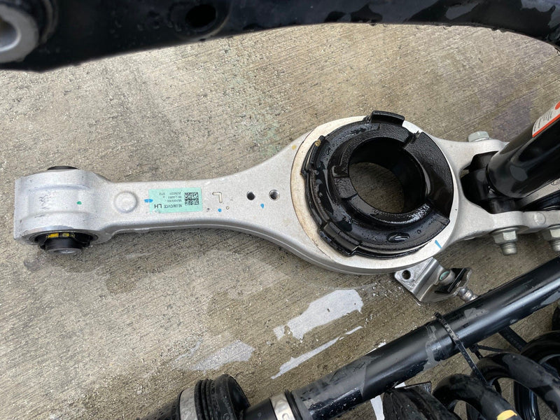 Load image into Gallery viewer, 2023-2025 HYUNDAI IONIQ 6 RWD REAR LEFT SIDE SUSPENSION KNEE ASSEMBLY # 112322
