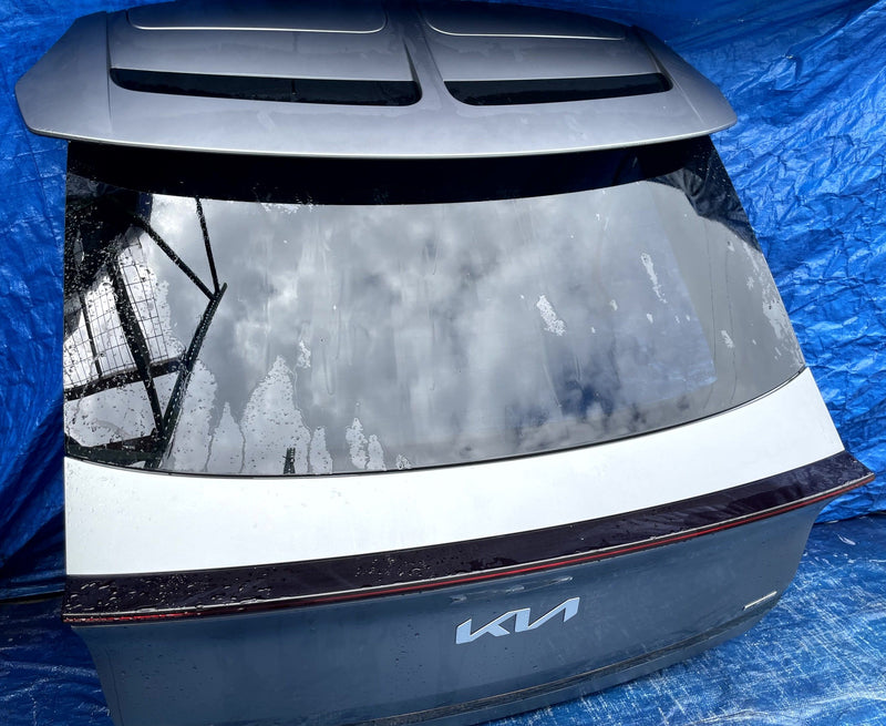 Load image into Gallery viewer, KIA EV6 REAR TRUNK LID DECK TAIL GATE TAILGATE GRAY (KLM) 2022-2024 # 109953
