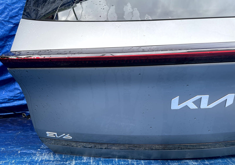 Load image into Gallery viewer, KIA EV6 REAR TRUNK LID DECK TAIL GATE TAILGATE GRAY (KLM) 2022-2024 # 109953
