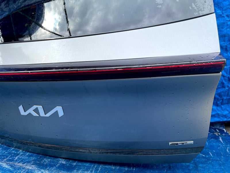 Load image into Gallery viewer, KIA EV6 REAR TRUNK LID DECK TAIL GATE TAILGATE GRAY (KLM) 2022-2024 # 109953
