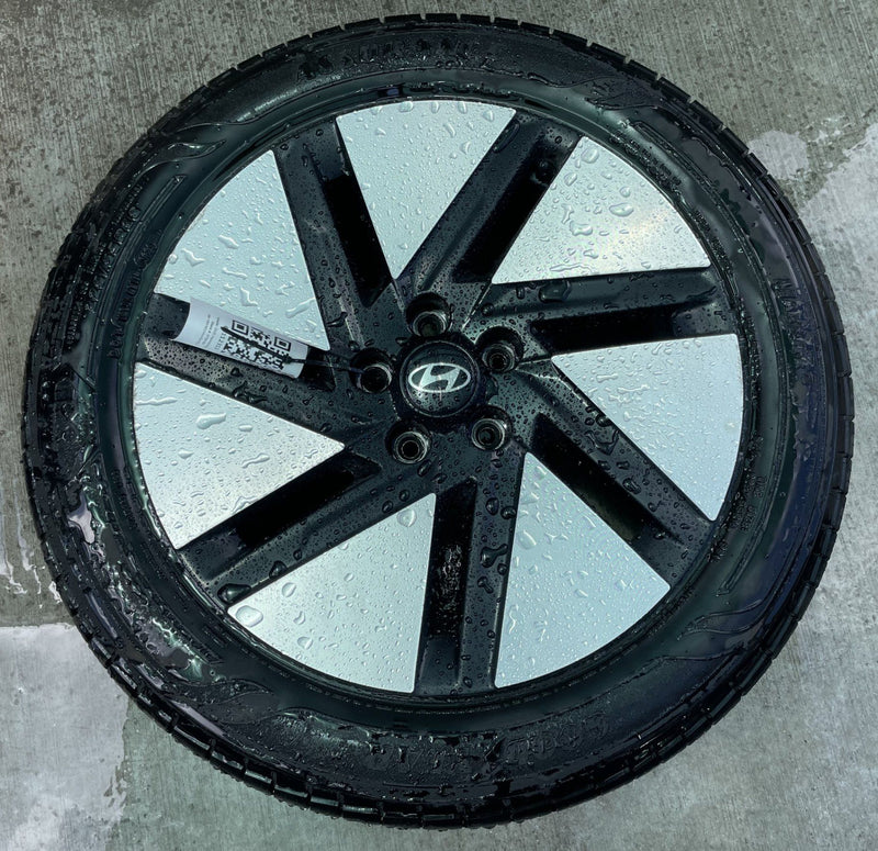 Load image into Gallery viewer, HYUNDAI IONIQ 6 18x7.5 BLACK 7-SLOT ALLOY WHEEL RIM W/TIRE (ONLY#1) 23-25 112313
