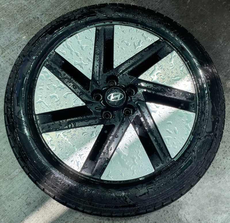 Load image into Gallery viewer, HYUNDAI IONIQ 6 18x7.5 BLACK 7-SLOT ALLOY WHEEL RIM W/TIRE (ONLY#1) 23-25 112314
