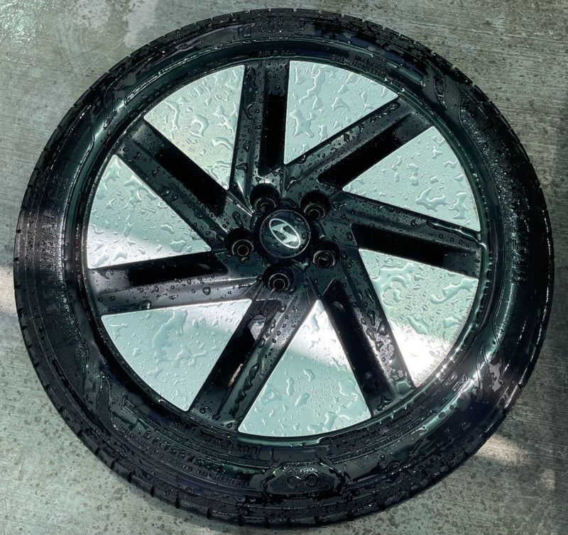 Load image into Gallery viewer, HYUNDAI IONIQ 6 18x7.5 BLACK 7-SLOT ALLOY WHEEL RIM W/TIRE (ONLY#1) 23-25 112314
