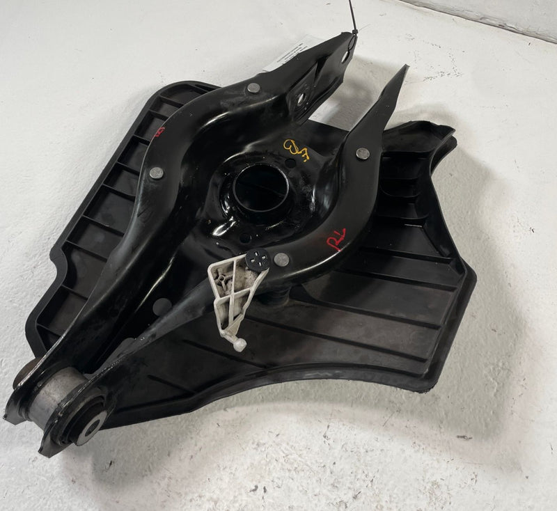 Load image into Gallery viewer, BMW 330i 330e REAR LEFT DRIVER SIDE LOWER CONTROL ARM SPRING PERCH # 106315

