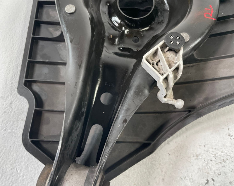 Load image into Gallery viewer, BMW 330i 330e REAR LEFT DRIVER SIDE LOWER CONTROL ARM SPRING PERCH # 106315
