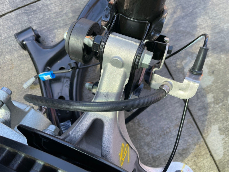 Load image into Gallery viewer, 2025-2026 HYUNDAI IONIQ 5 AWD FRONT LEFT SIDE SUSPENSION KNEE ASSEMBLY # 110469
