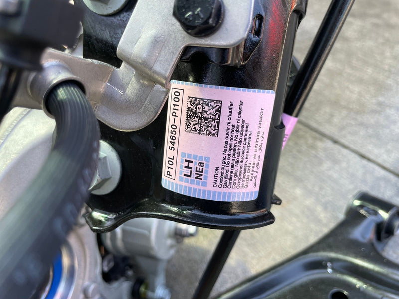 Load image into Gallery viewer, 2025-2026 HYUNDAI IONIQ 5 AWD FRONT LEFT SIDE SUSPENSION KNEE ASSEMBLY # 110469

