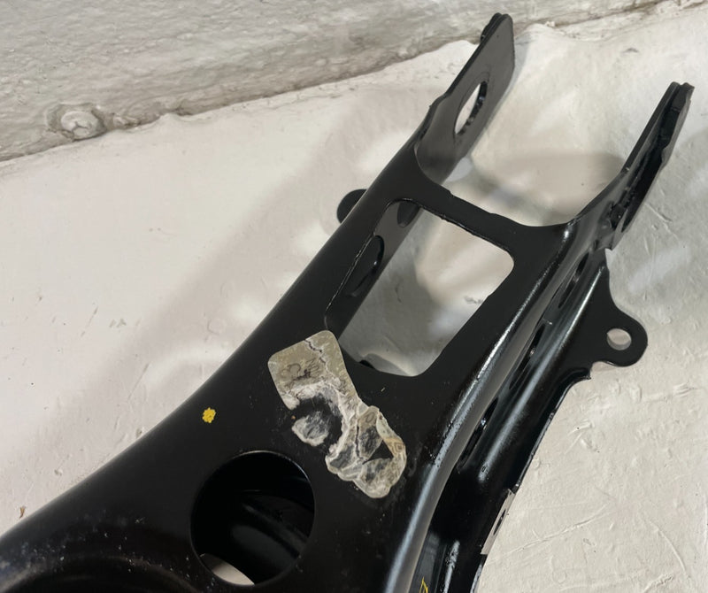 Load image into Gallery viewer, 2020-2025 CADILLAC CT5 REAR LEFT LOWER FORWARD CONTROL ARM SPRING PERCH # 104990
